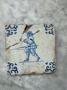 33) tile with fisherman