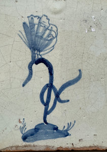 T58)17 th century delft tile with butterfly