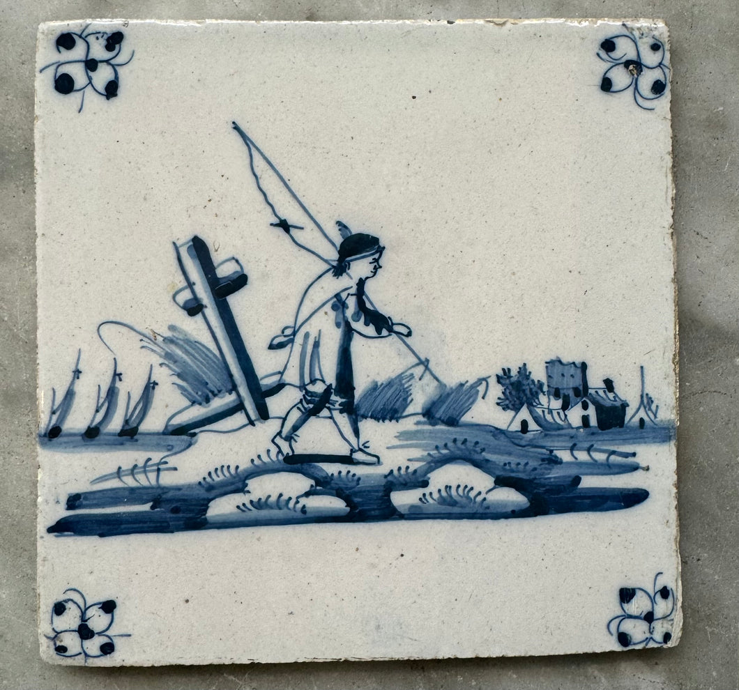 T75)18 th century delft tile with fisherman