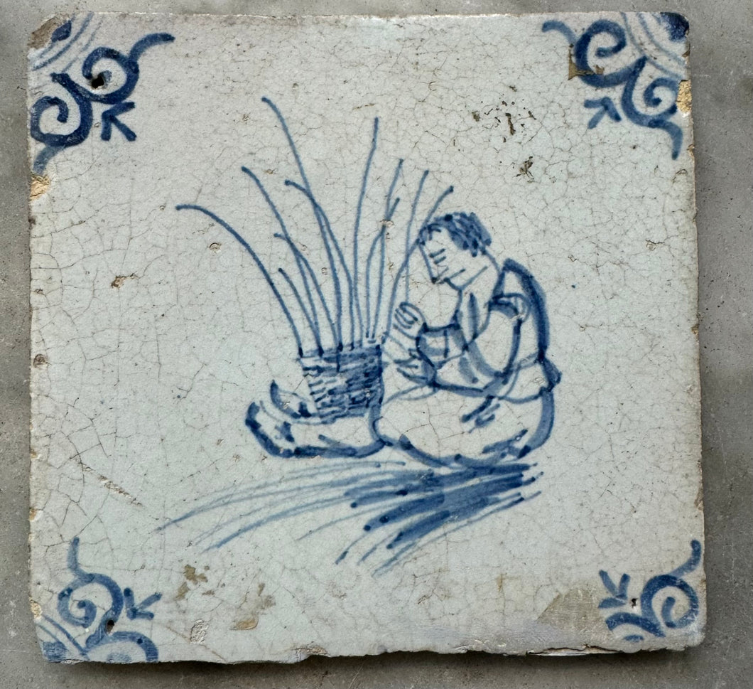 71)17 th century delft tile with craftsman