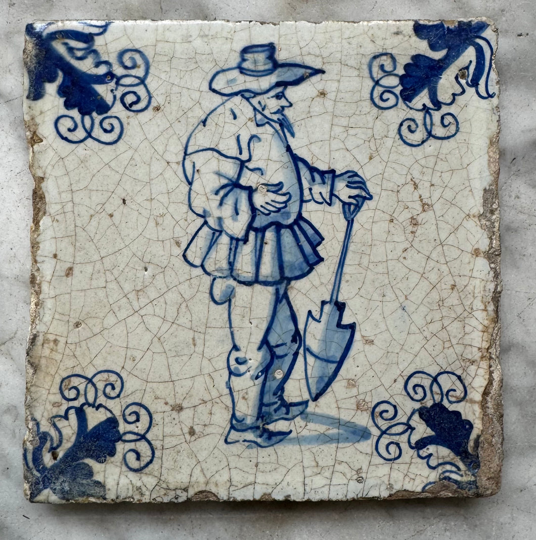T87) 17 th century man working