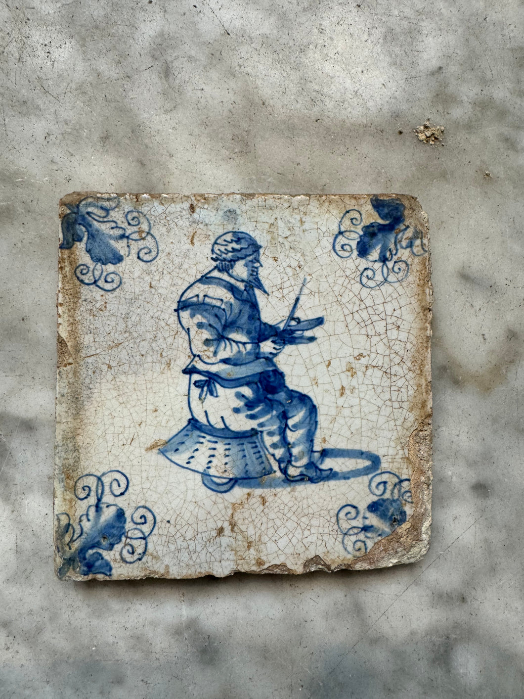 T17) delft tile with profession/ sharping knives