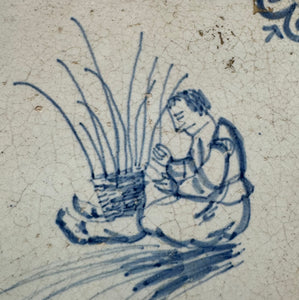 71)17 th century delft tile with craftsman