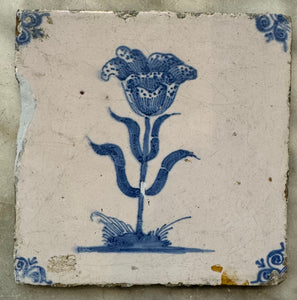 T69)blue and white flower tile made around 1700