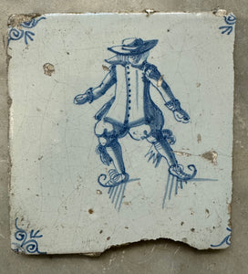 T78)17 th century tile with scater