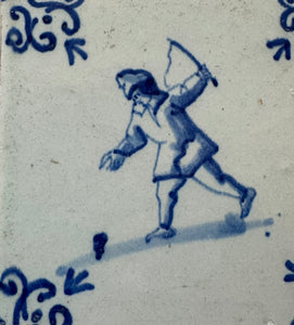 T62 delft tile with child playing with a top