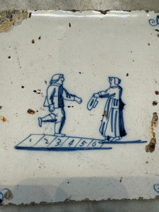 T49)18th century delft tile withchildren playing