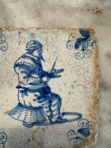 T17) delft tile with profession/ sharping knives