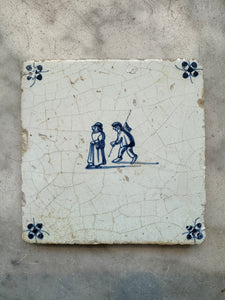 T7)17 th century delft handpainted tile people