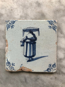 17th century Delft handpainted dutch tile with woman