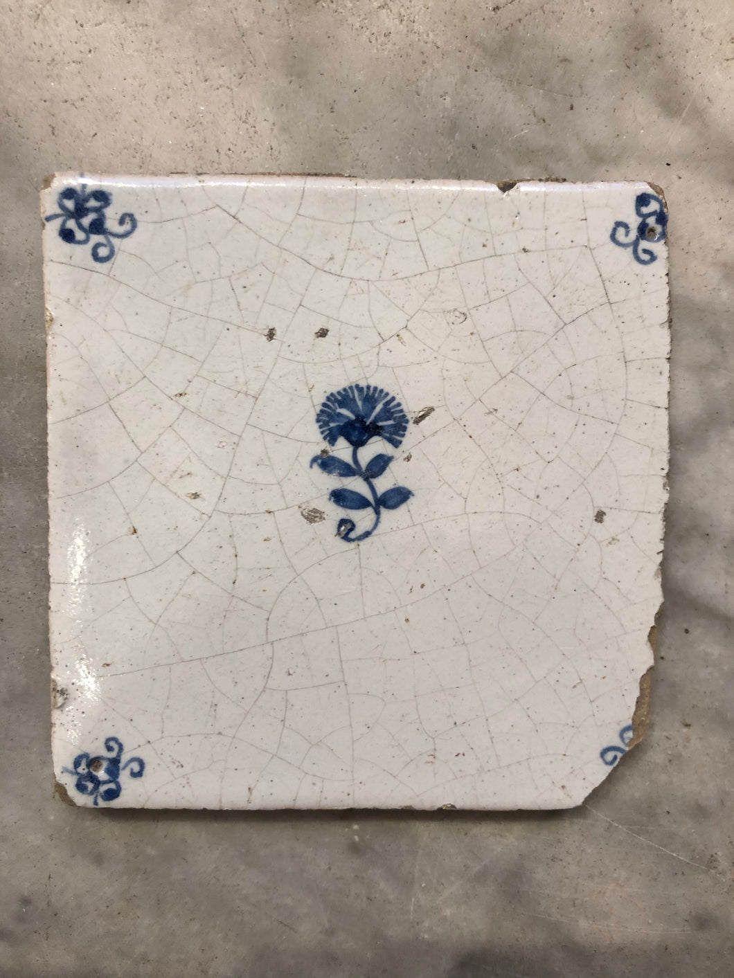 Rare 17th century delft tile with flower