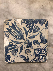 Dutch delft handpainted tile with tulips and grapes