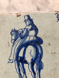 17 th century delft tile with woman on horse