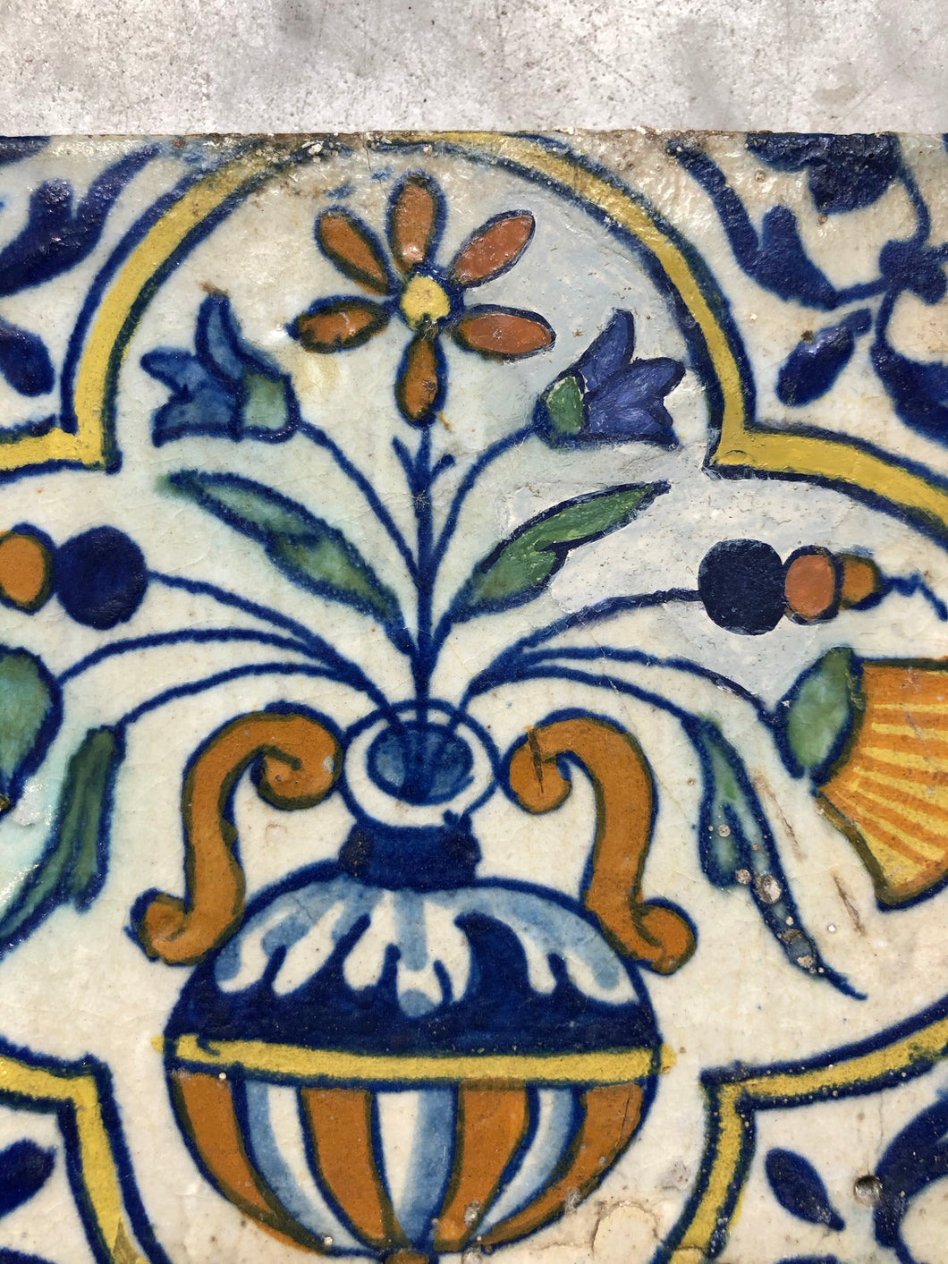 Early 17 th century delft tile with flowervase