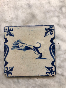 Handpainted dutch delft tile with dog