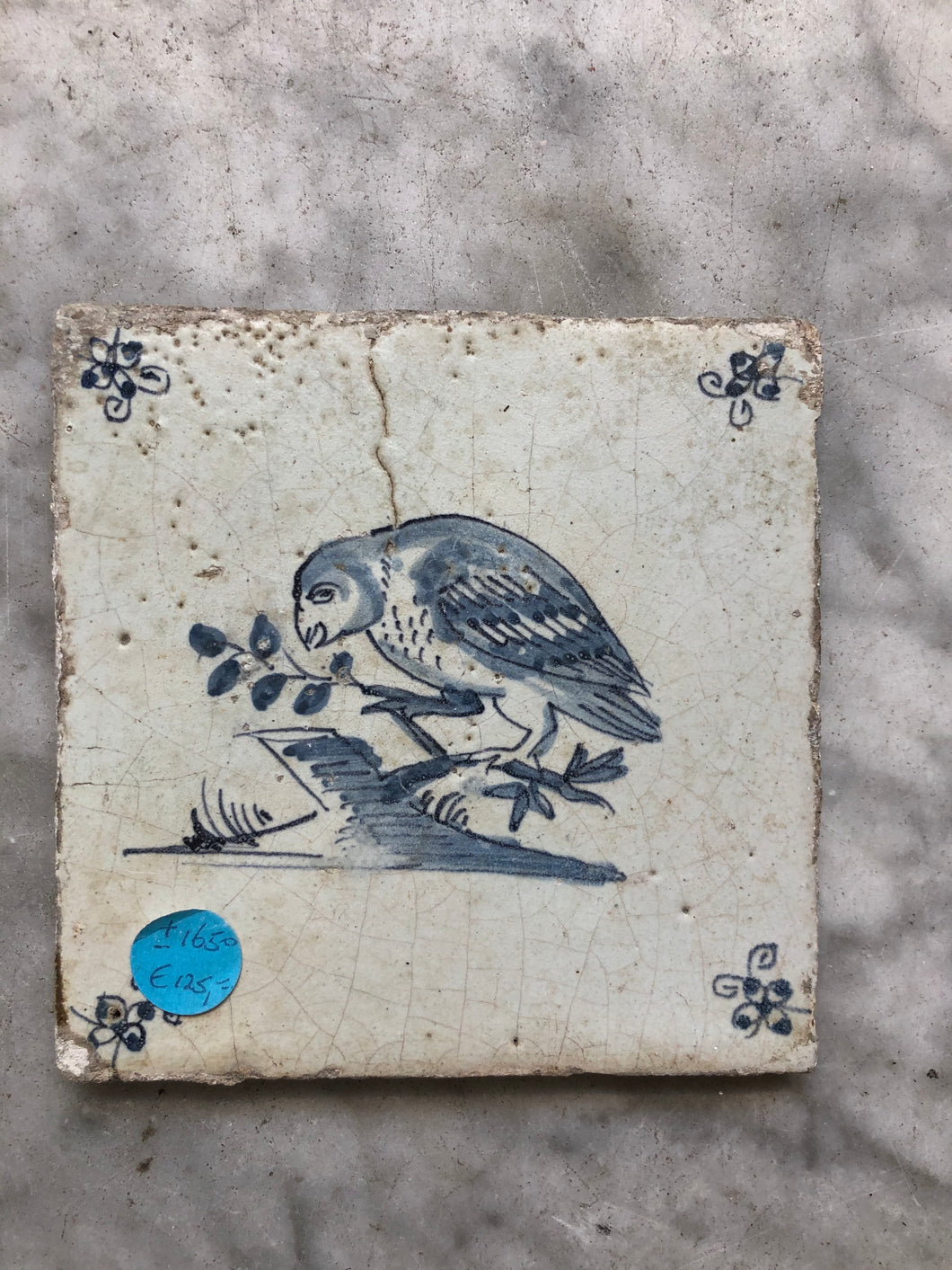 17 th century delft tile parrot