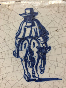 17 th century delft tile with man on horse