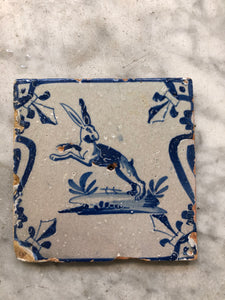 17 th century delft tile with hair