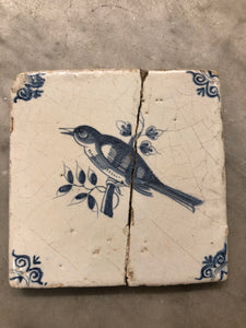 17 th century delft tile with bird handpainted