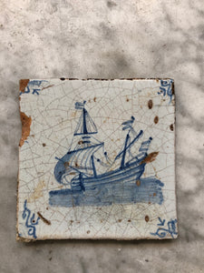 17 th century delft tile with warship