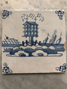 18 th century delft tile with birdhouse