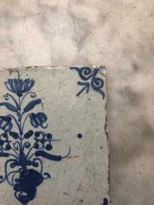 Handpainted dutch delft tile with flowervase around 1660