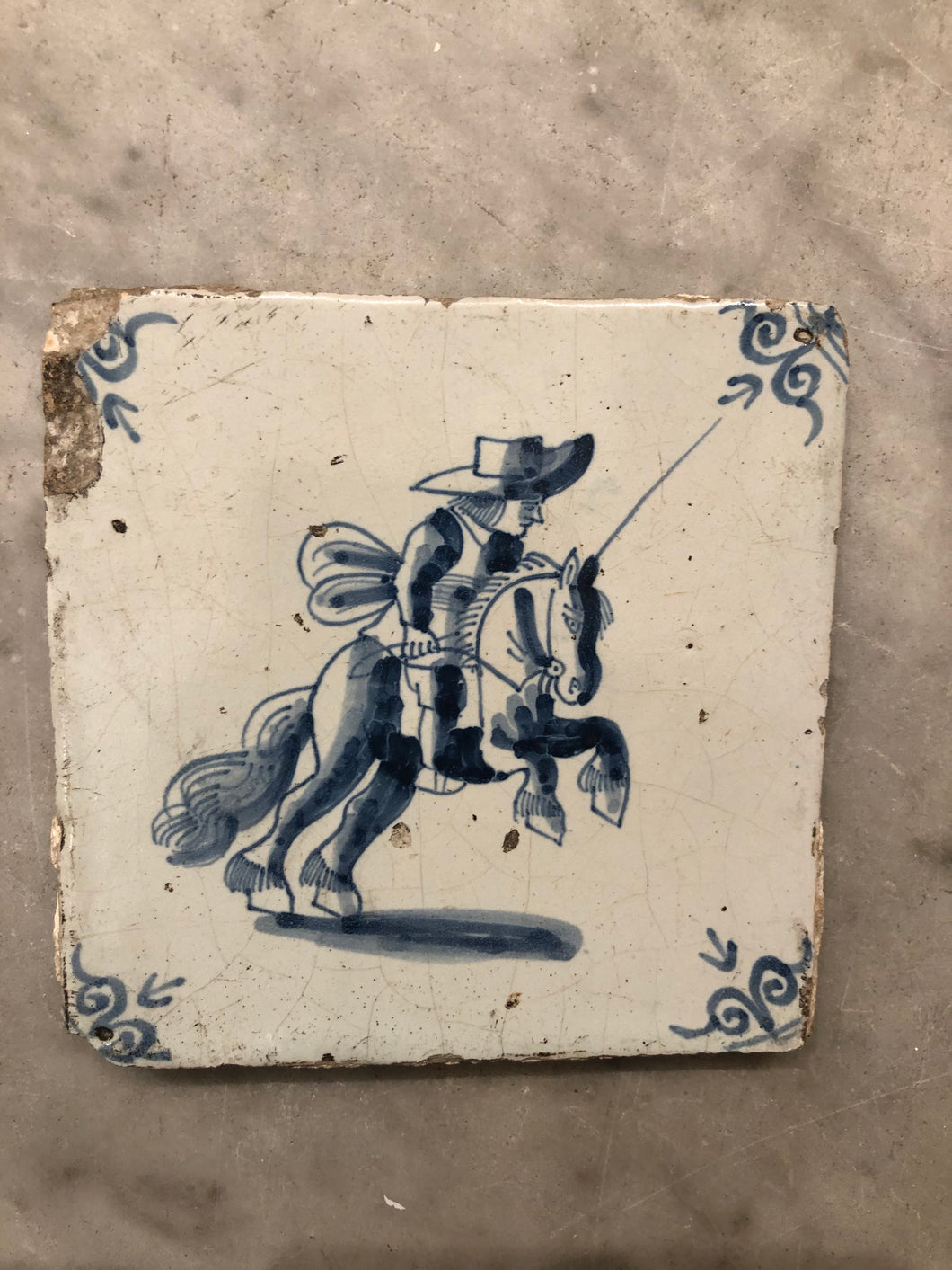 17 th century delft tile with horseman