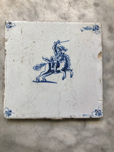 17 th century delft tile with horseman